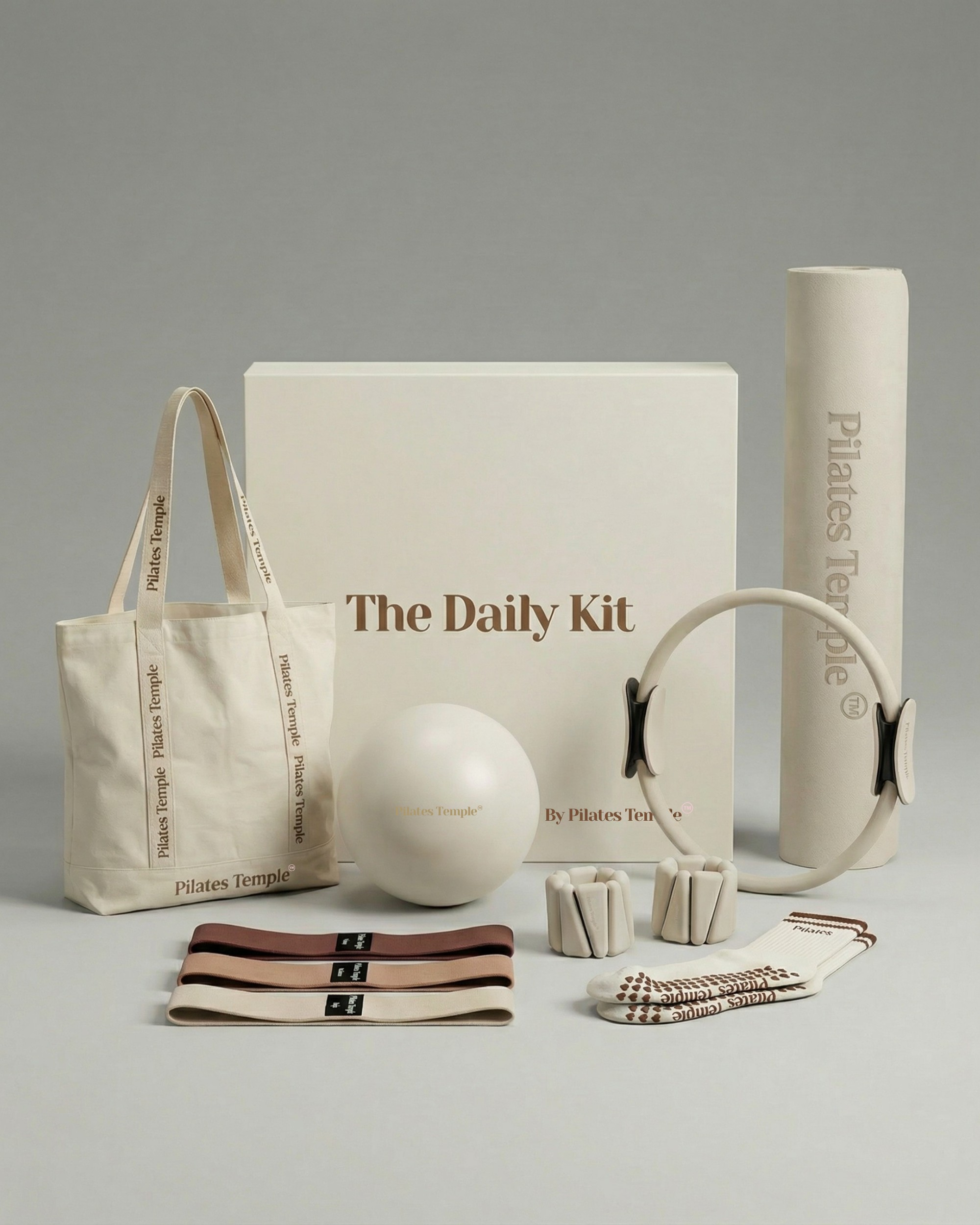 #color-Crème Coffret Pilates complet Daily Kit Crème : tapis, ring, ball, poids et autres accessoires.