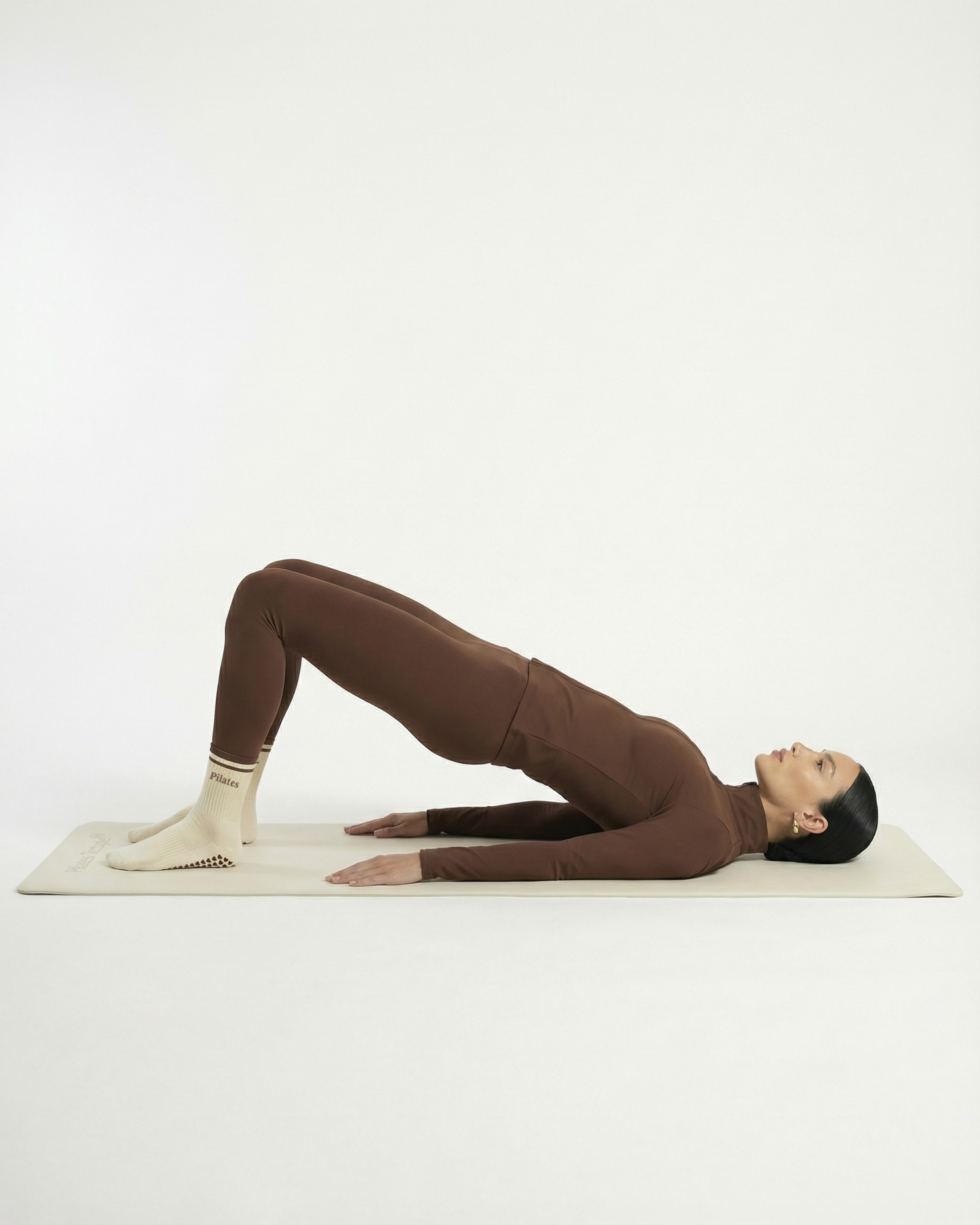 #color-Crème Séance de Pilates à la maison sur tapis de pilates premium.