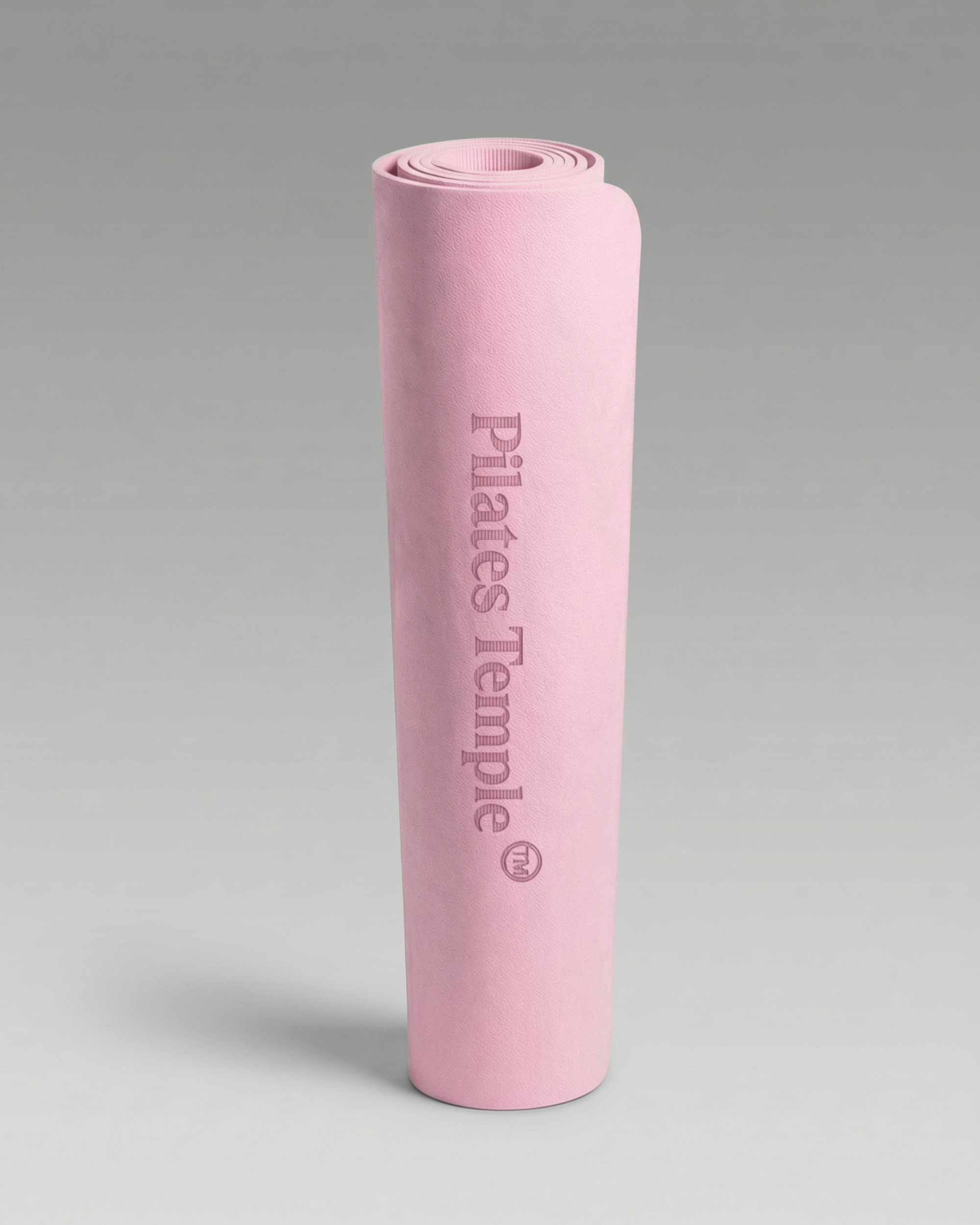 #color-Rose #color-Pink Tapis de Pilates premium haute densité enroulé.