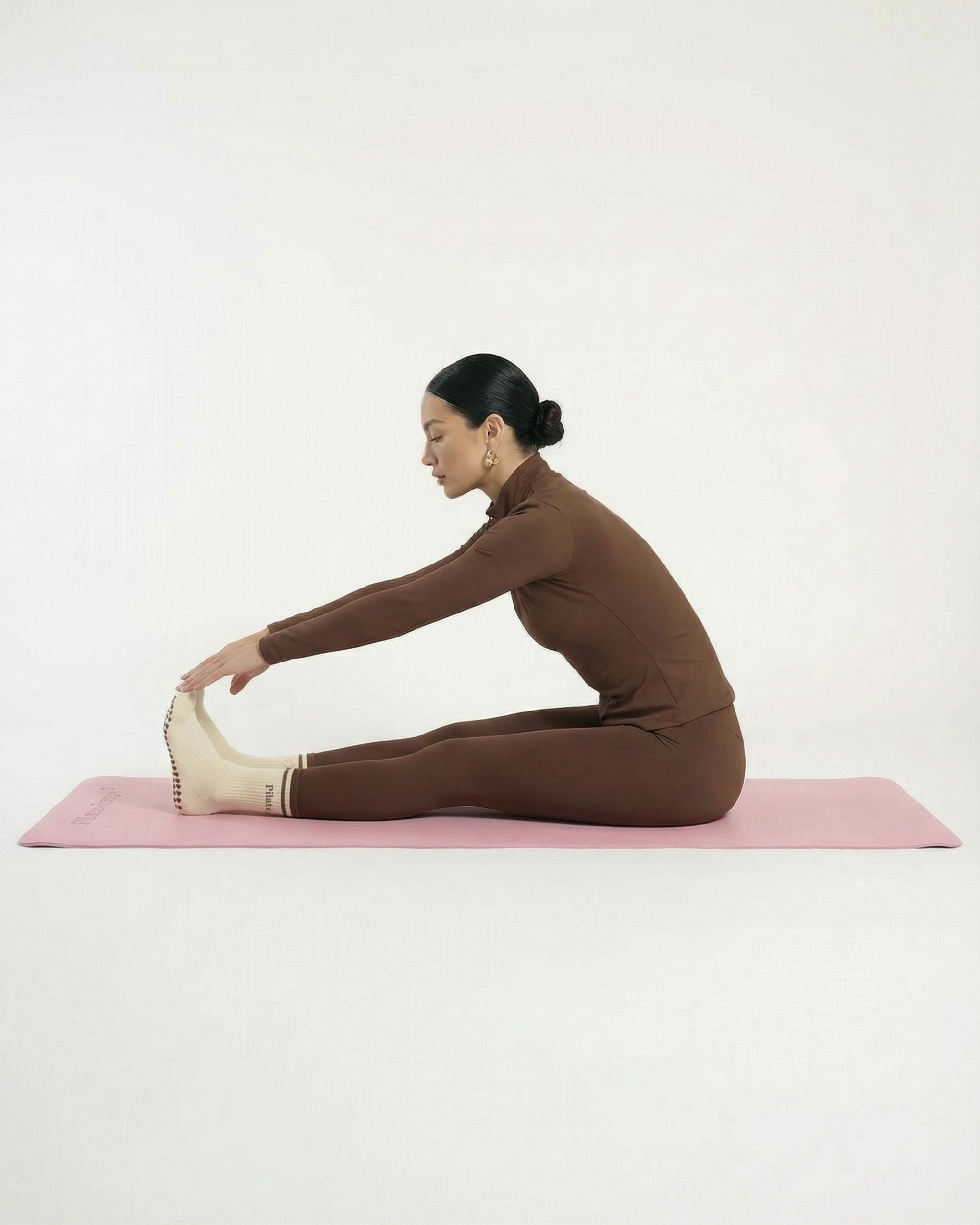 #color-Rose Séance de Pilates à la maison sur tapis de pilates premium.